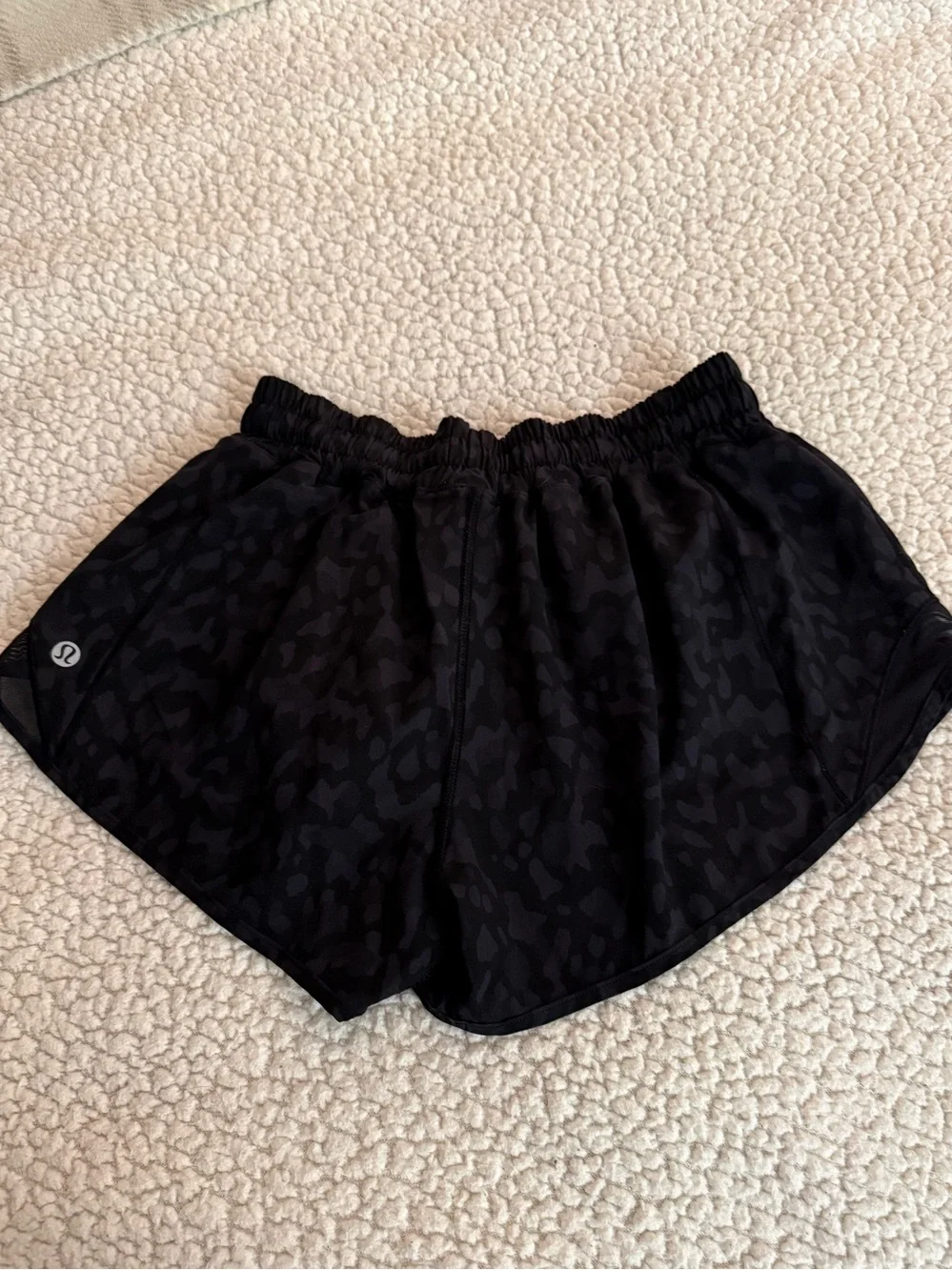 Lululemon Hotty Hot low rise shorts. Size 6. 2.5 inseam. Black animal print